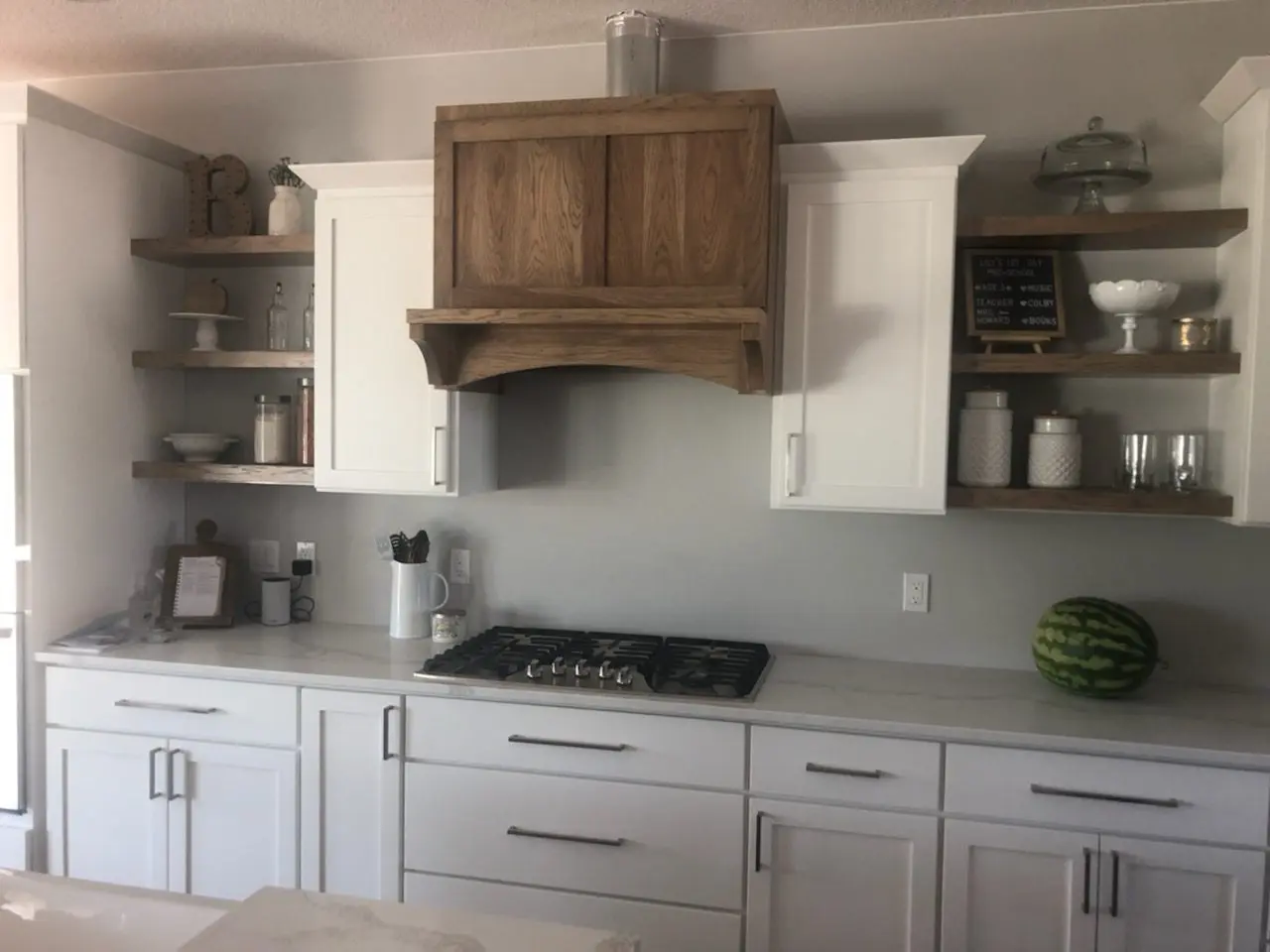 The custom and prefab kitchen decor with floating shelves