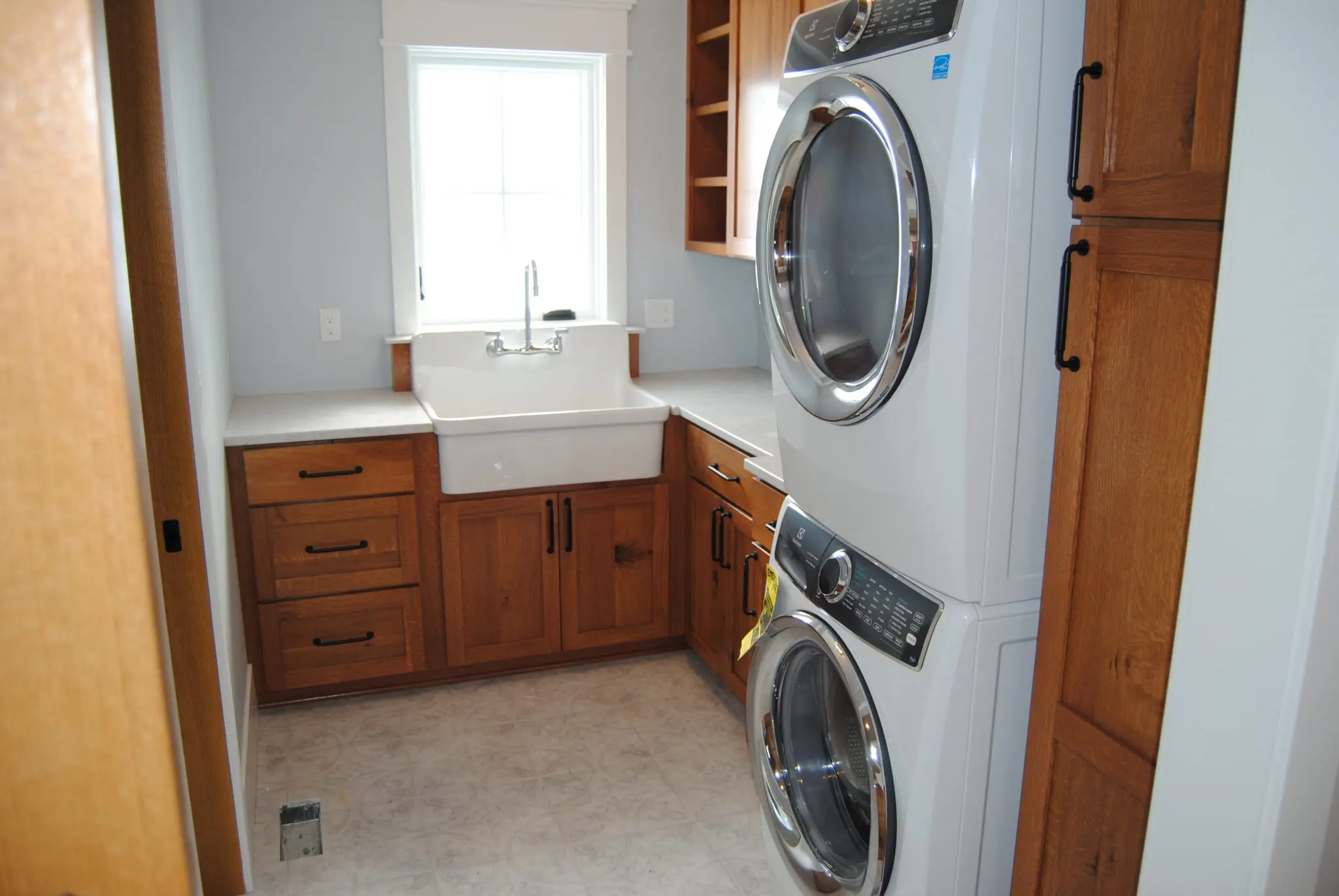 Laundry room remodelling with side cabinet