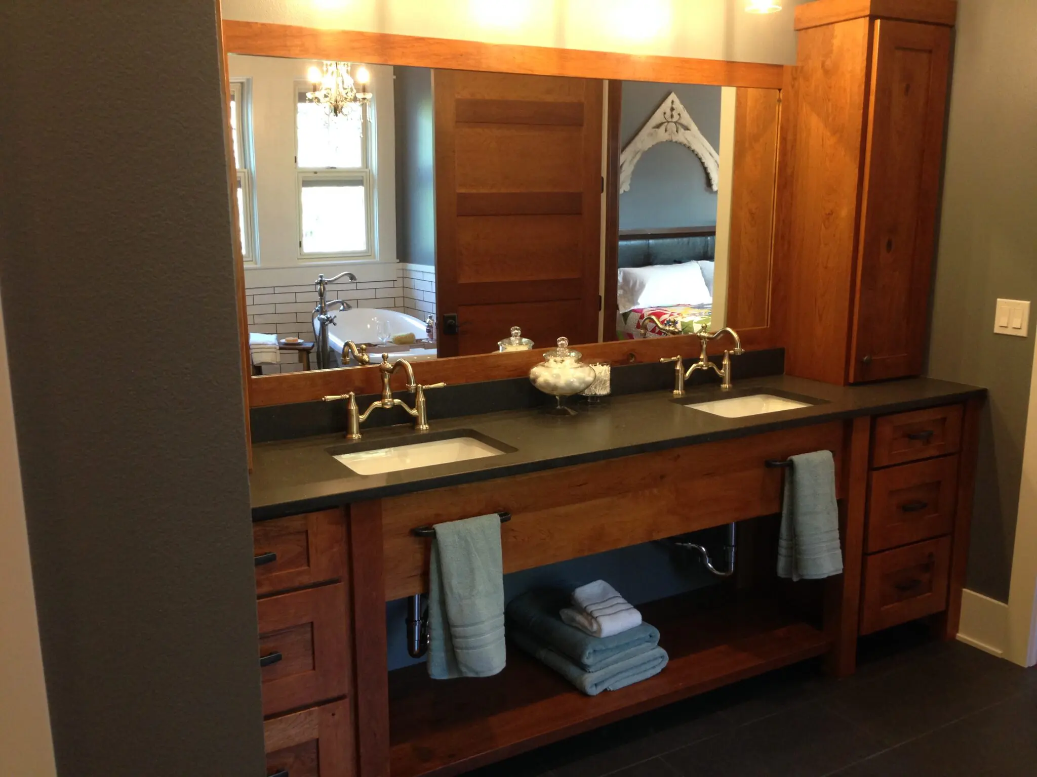 Traditional bathroom remodelling with curio cabinets